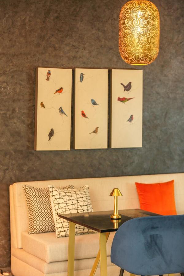 Suite Azur Hotel Essaouira Exterior photo A set of three paintings by the artist