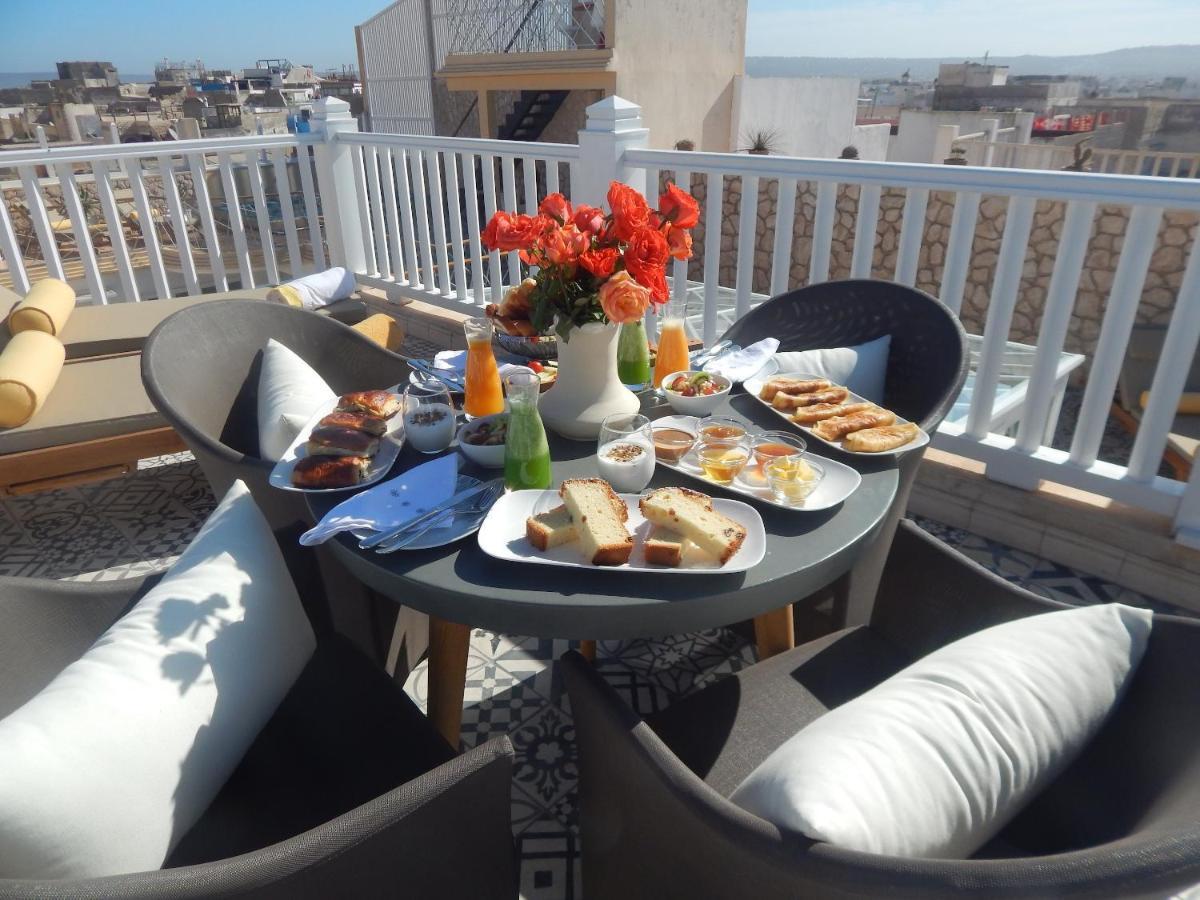 Suite Azur Hotel Essaouira Exterior photo A breakfast table in Morocco